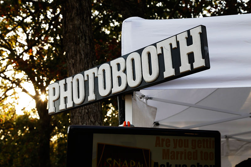 ipad station and hashtag printing outside photo booth in okc