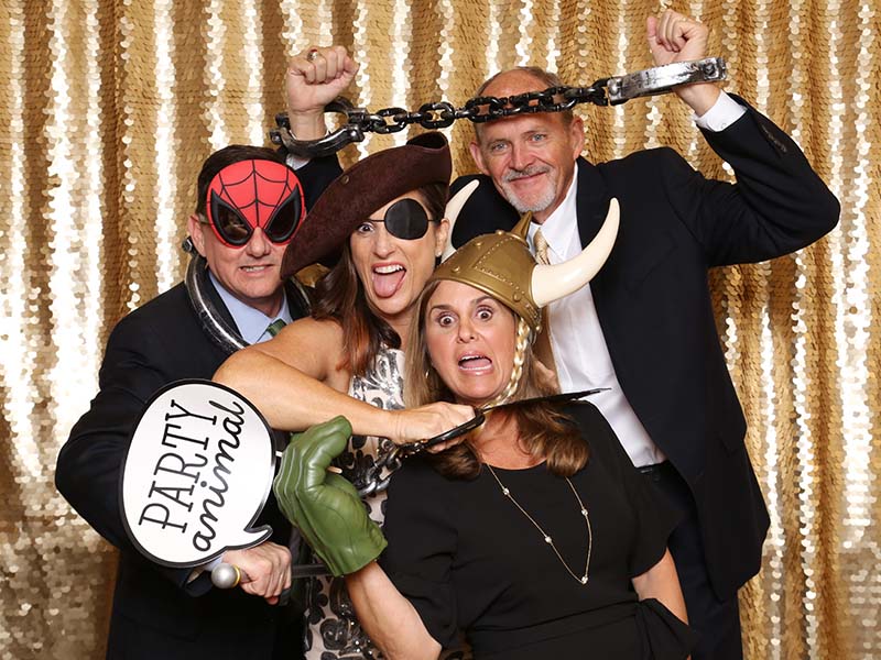 silly_group Party goers having fun inside a photo booth!